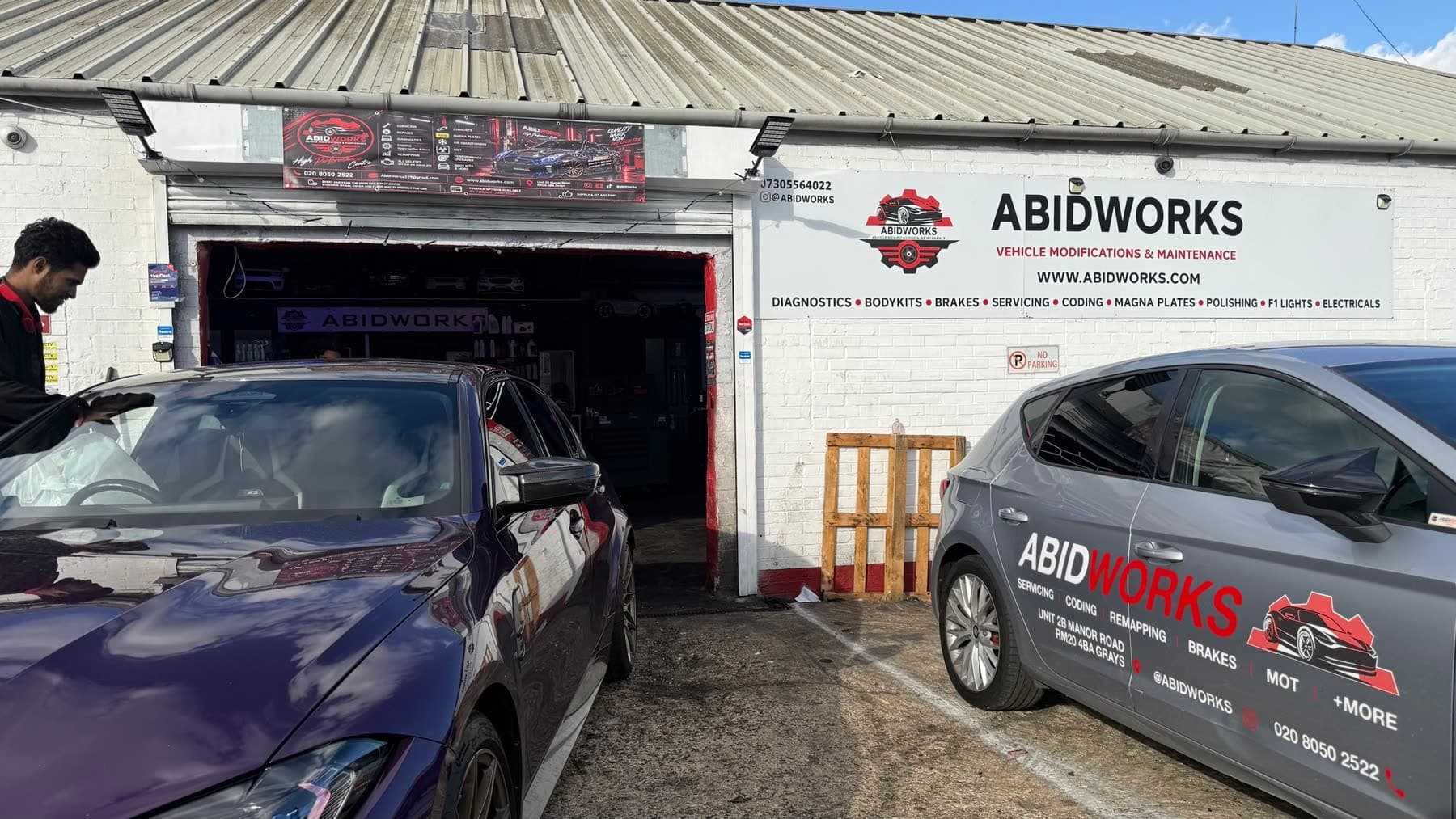 The Abidworks workshop door and sign on Manor Road, Grays