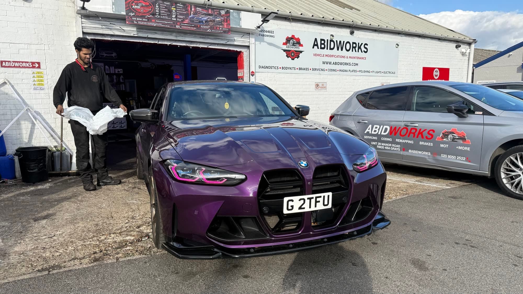 Purple BMW M3 on the Abidworks forecourt in Grays
