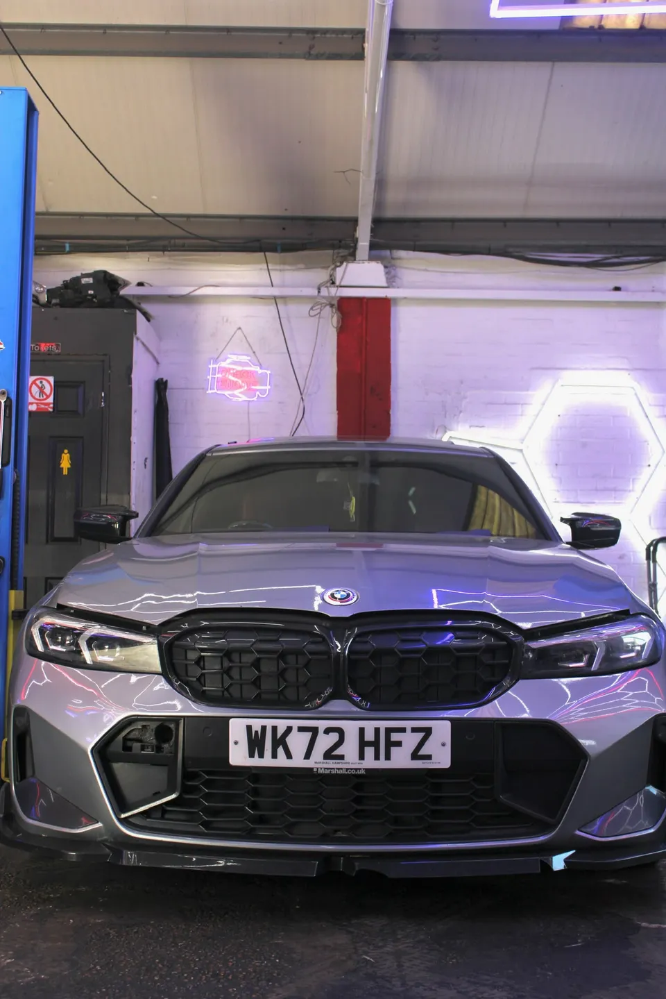 Grey BMW 3 Series in the Abidworks workshop, Grays