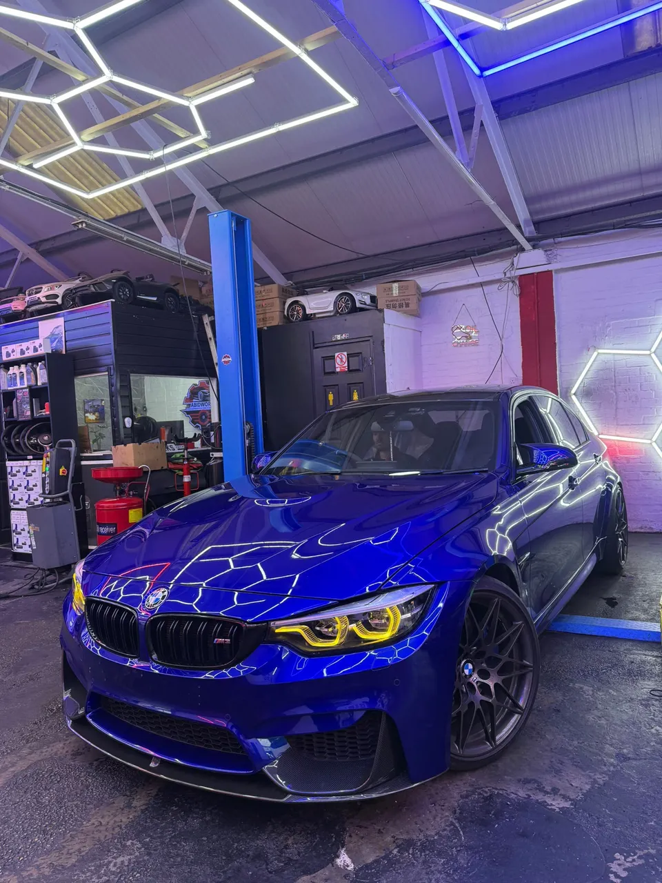Blue BMW M3 in the Abidworks workshop, Grays